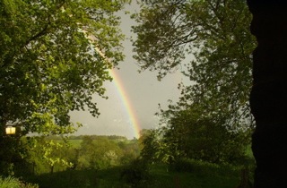 Rainbow over a wet Herefordshire view