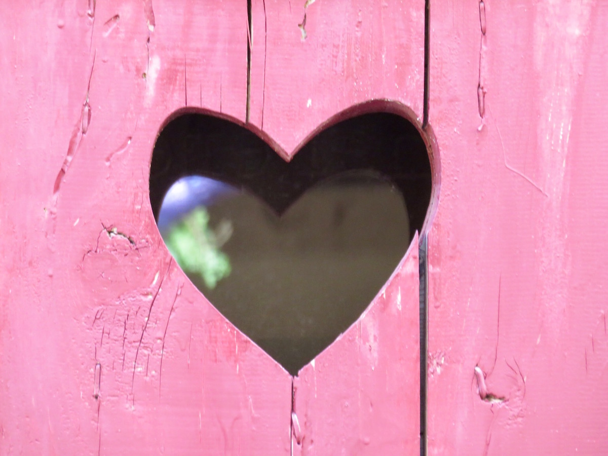 Heart carved into a window shutter