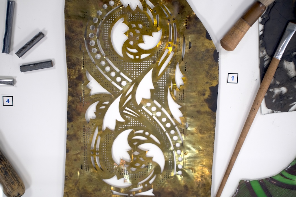 Photograph of decorative arts stencil and tools